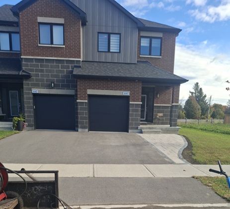 A new driveway that is faded before sealing